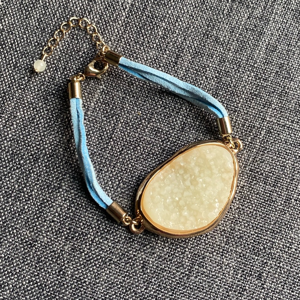 GV9 bracelet with blue leather straps and gold accents with cream Druzy stones